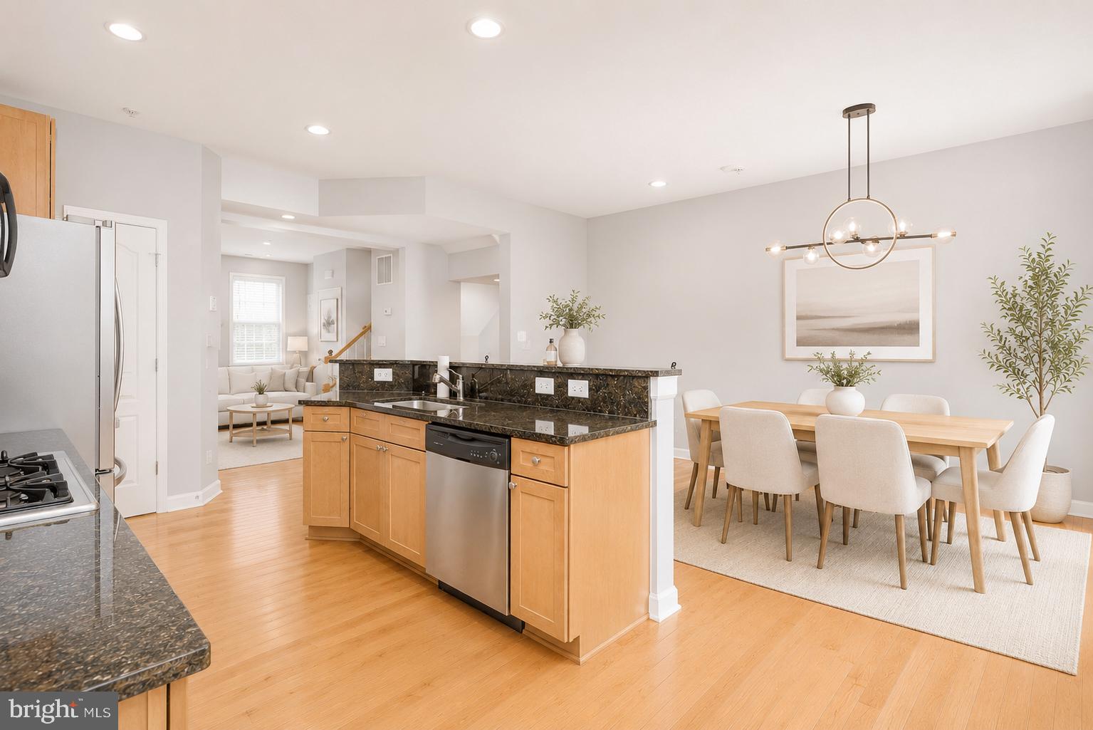 1510 Stack Street Baltimore, MD 21230 - Photo 7 of 32 a large kitchen with kitchen island a sink table and chairs