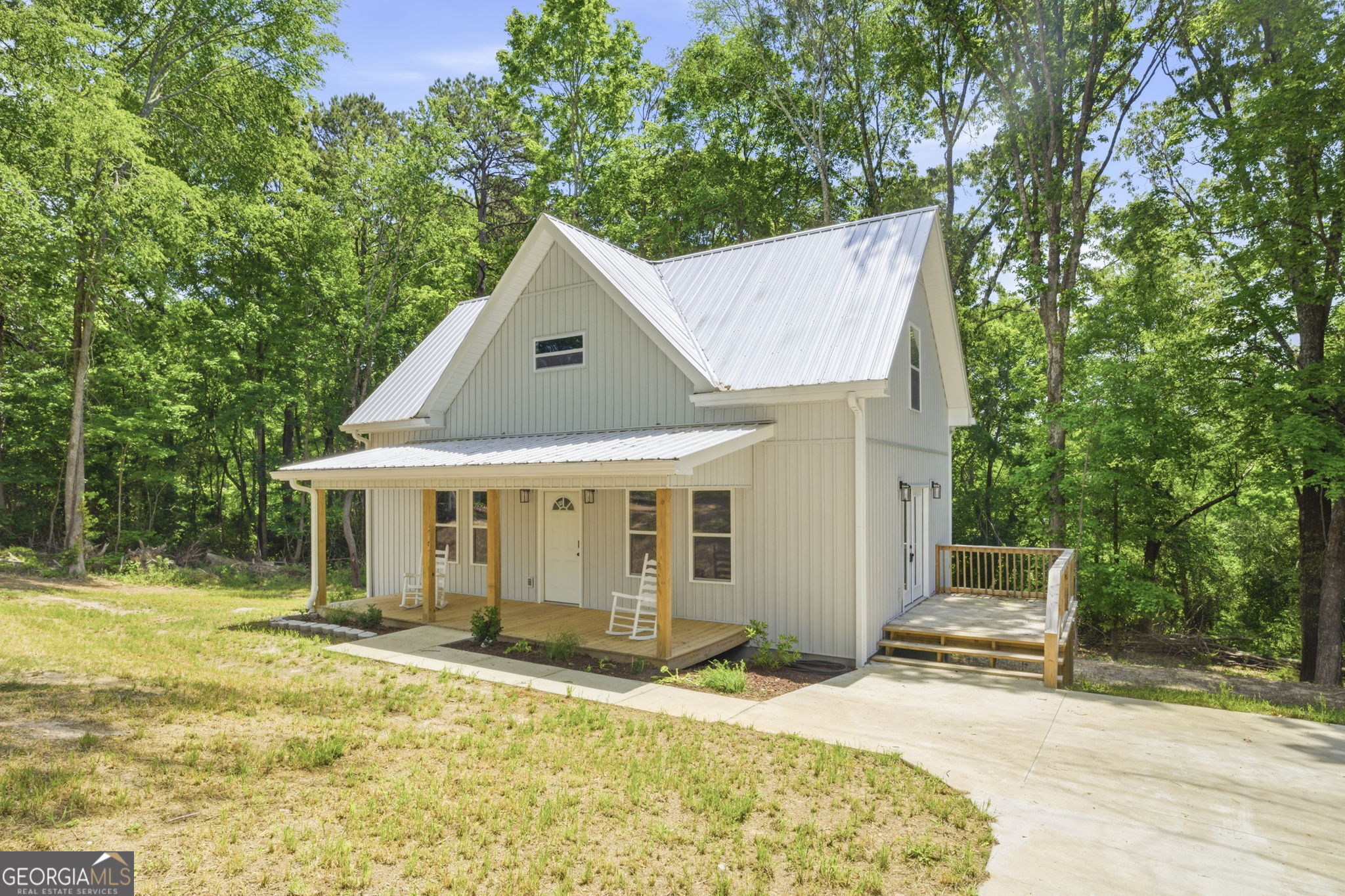 55 Reece Street Menlo, GA 30731 - Photo 31 of 36 a house with trees in the background