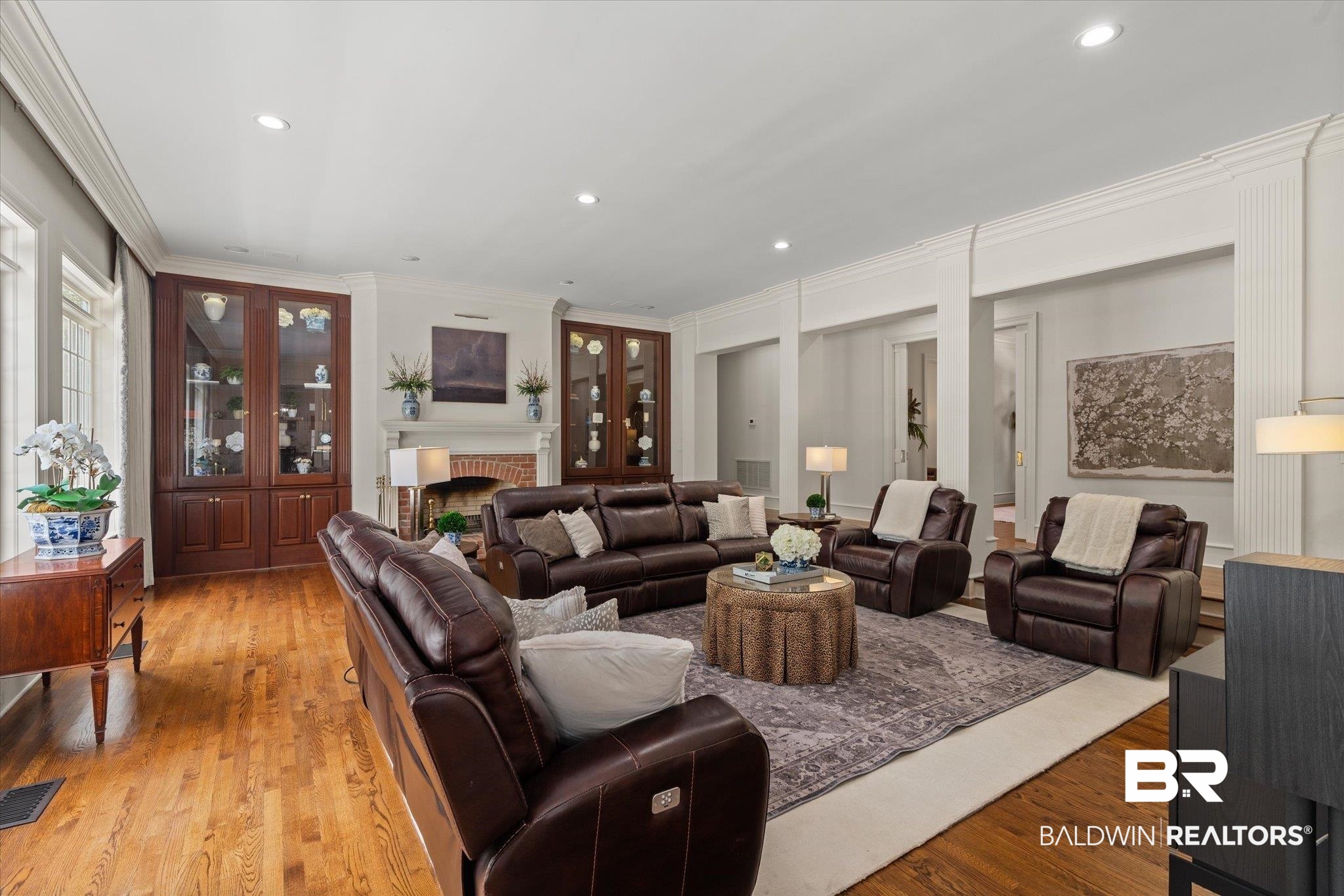 8561 Dawes Lake Road Mobile, AL 36619 - Photo 14 of 63 Living area with crown molding, wood finished floors, recessed lighting, and a fireplace