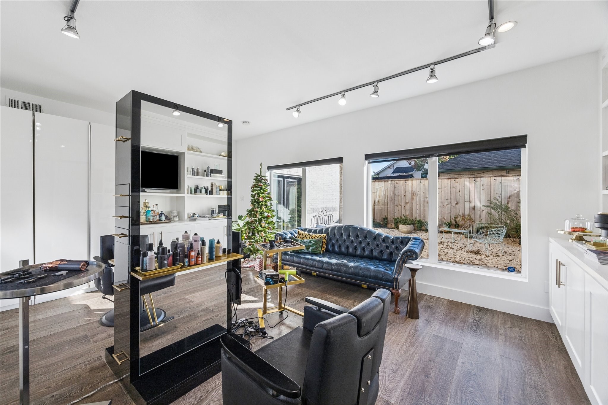 1919 Missouri Street Houston, TX 77019 - Photo 2 of 27 a living room with furniture and a flat screen tv