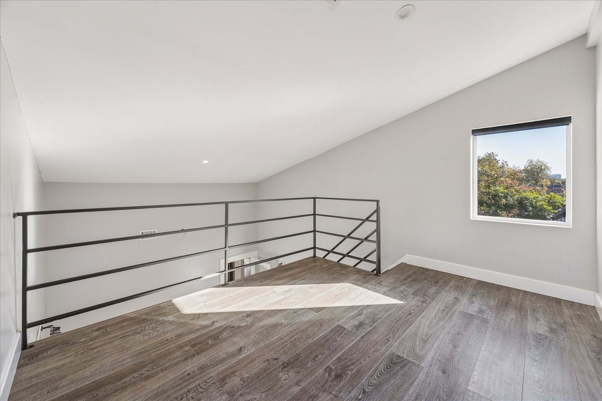 1919 Missouri Street Houston, TX 77019 - Photo 25 of 27 a view of a room with wooden floor