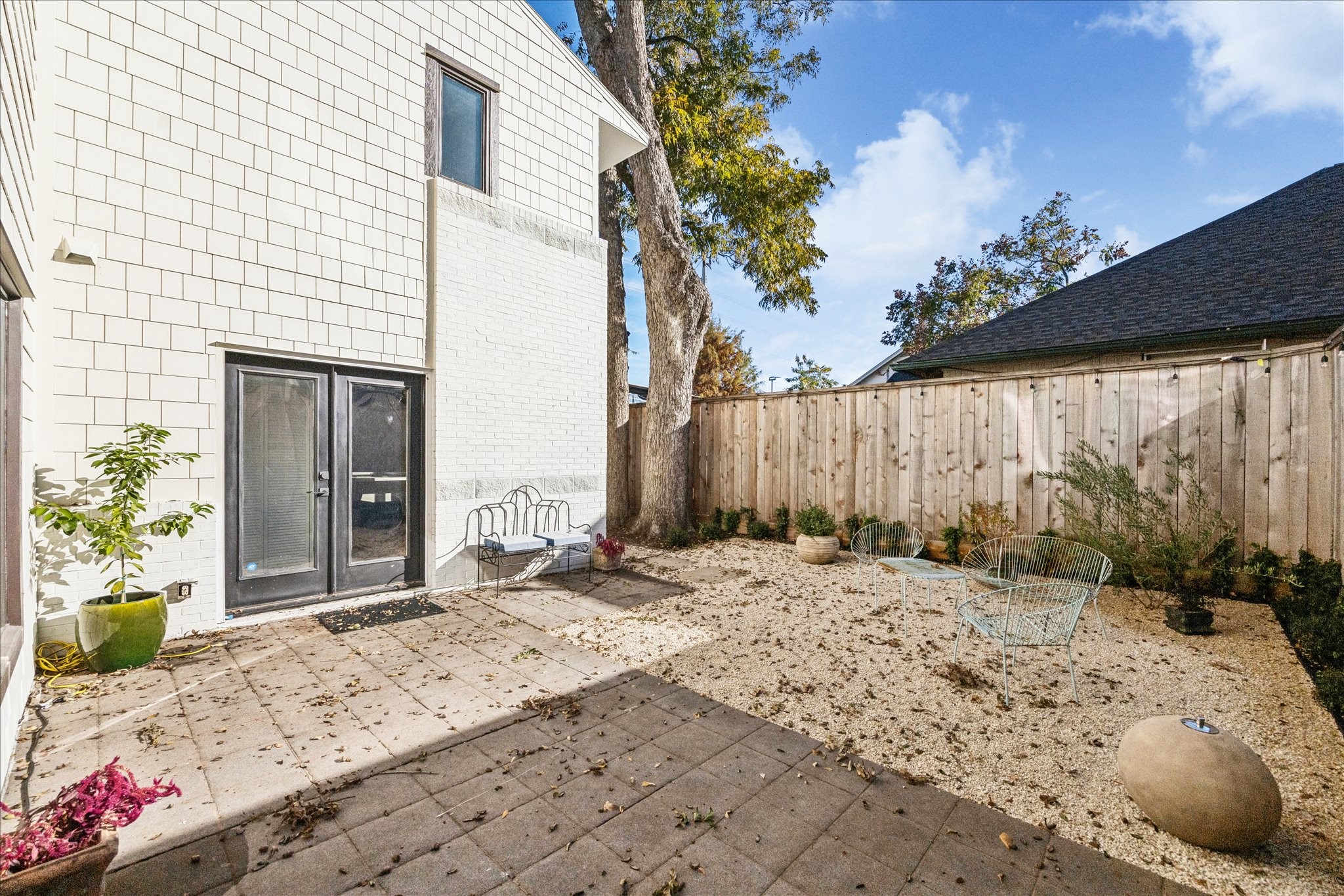 1919 Missouri Street Houston, TX 77019 - Photo 27 of 27 a row of backyard of a house