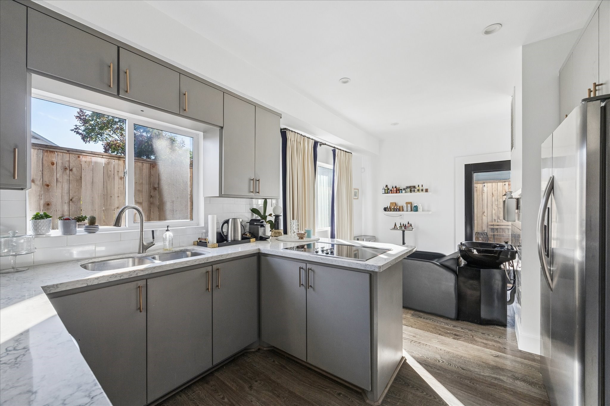 1919 Missouri Street Houston, TX 77019 - Photo 10 of 27 a kitchen with a sink stove and refrigerator