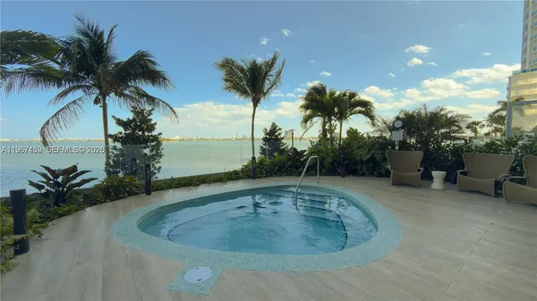 a room with gym equipment and a large window