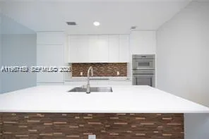 a view of lobby with chandelier