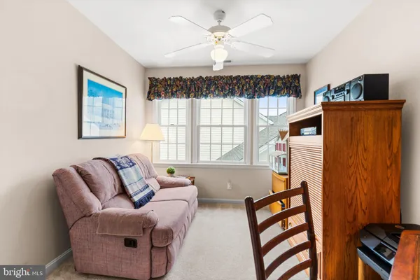 aerial view of a house with a ocean view