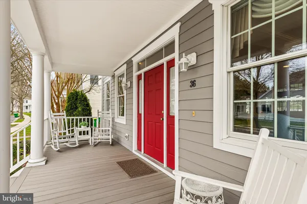a view of balcony with wooden floor