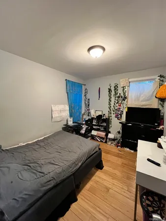 a bed room with a bed and a couch