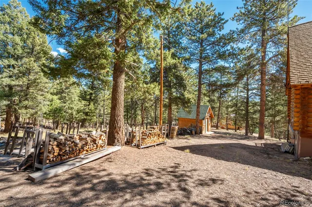 a sign board with river in the back