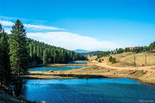 a view of a swimming pool with an ocean view