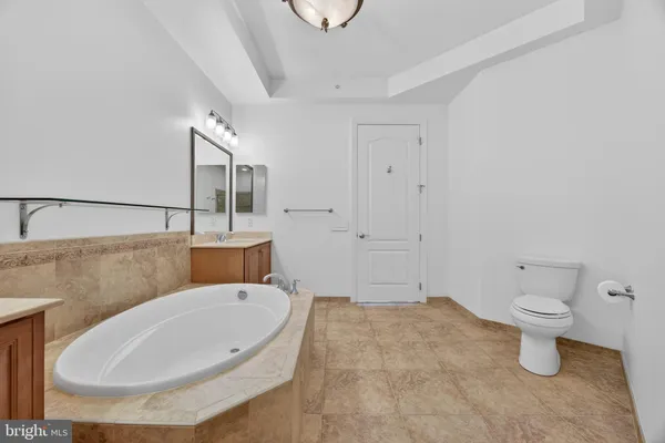 a bathroom with a shower curtain and a sink
