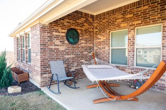 a outdoor dining space with furniture