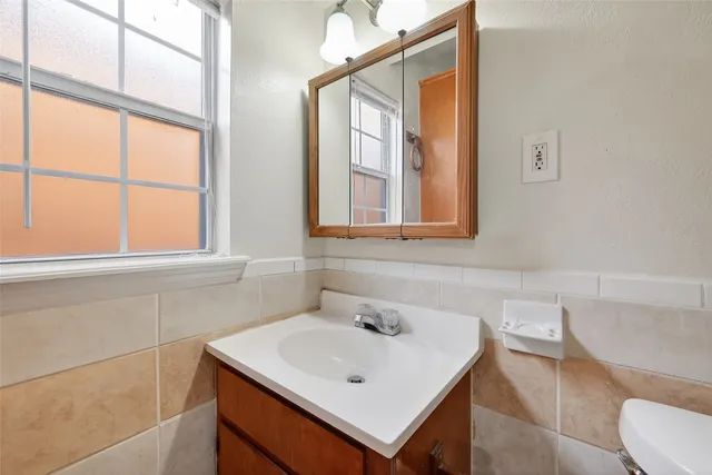 a bathroom with a sink and a toilet
