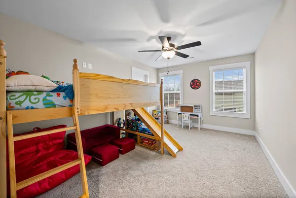 a view of a balcony with wooden floor