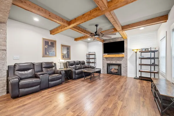 a view of a livingroom with furniture and a table