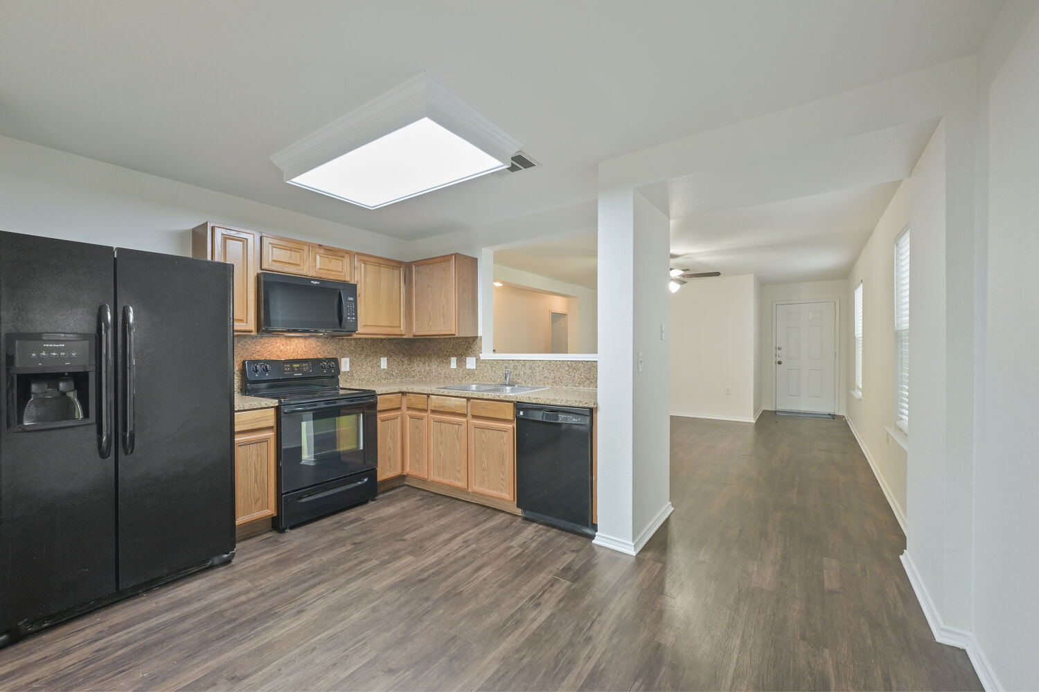 6733 Doyal Drive Austin, TX 78747 - Photo 28 of 28 A well-appointed kitchen with an open floorplan offers a seamless transition to the main living areas.