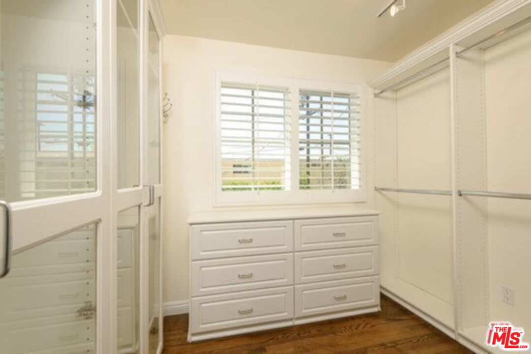 426 Venice Way Venice, CA 90291 - Photo 20 of 21 a bathroom with a window and a wooden floor