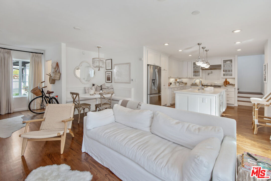 426 Venice Way Venice, CA 90291 - Photo 6 of 21 a living room with stainless steel appliances kitchen island granite countertop furniture and a view of kitchen