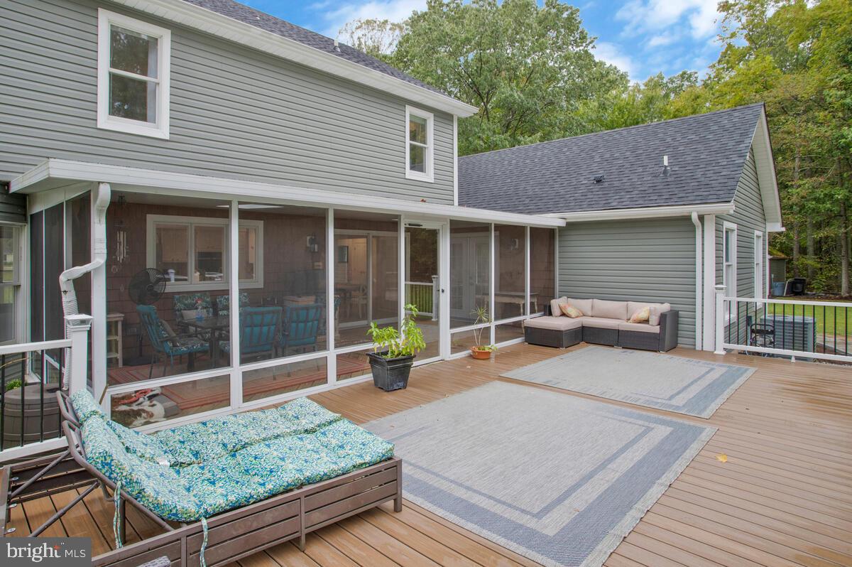 1200 Steamboat Road Shady Side, MD 20764 - Photo 11 of 84 View of screened in porch and trex deck