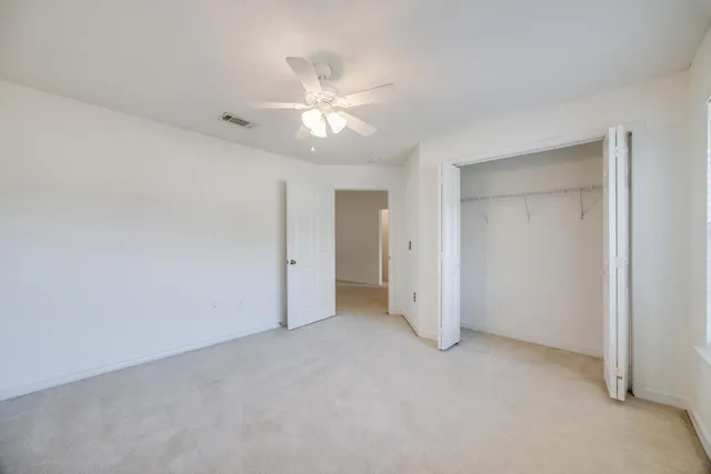 an empty room with a bathroom