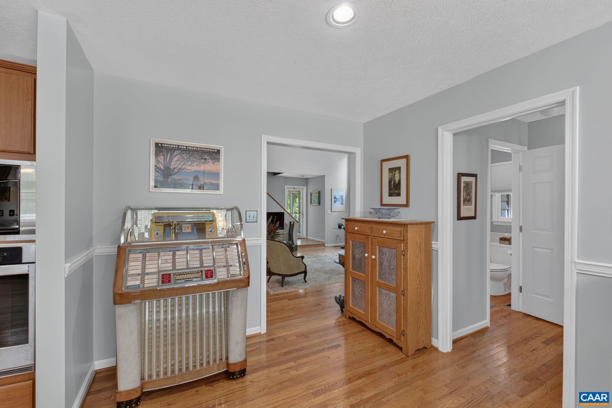5363 Stony Point Road Barboursville, VA 22923 - Photo 23 of 66 This area can be used as part of the Eat In area or whatever you choose. Photo is showing views to the right of the Half Bath and ahead to the Great Room. The Great Room is a sunken room with four areas stepping one step down...please be aware!!
