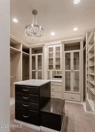 a bathroom with a double vanity sink mirror and shower