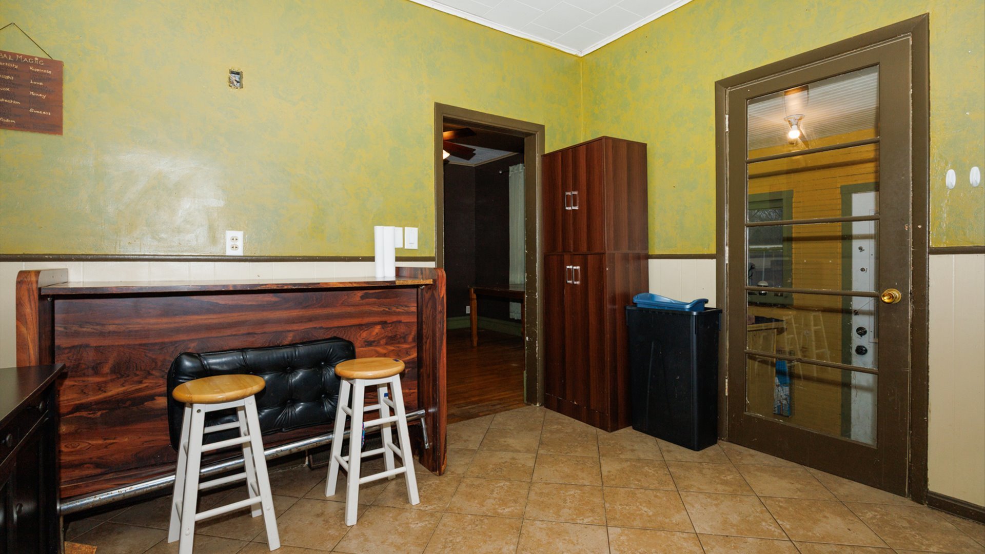 517 North Walnut Street Clinton, IL 61727 - Photo 18 of 29 a kitchen with a refrigerator and cabinets