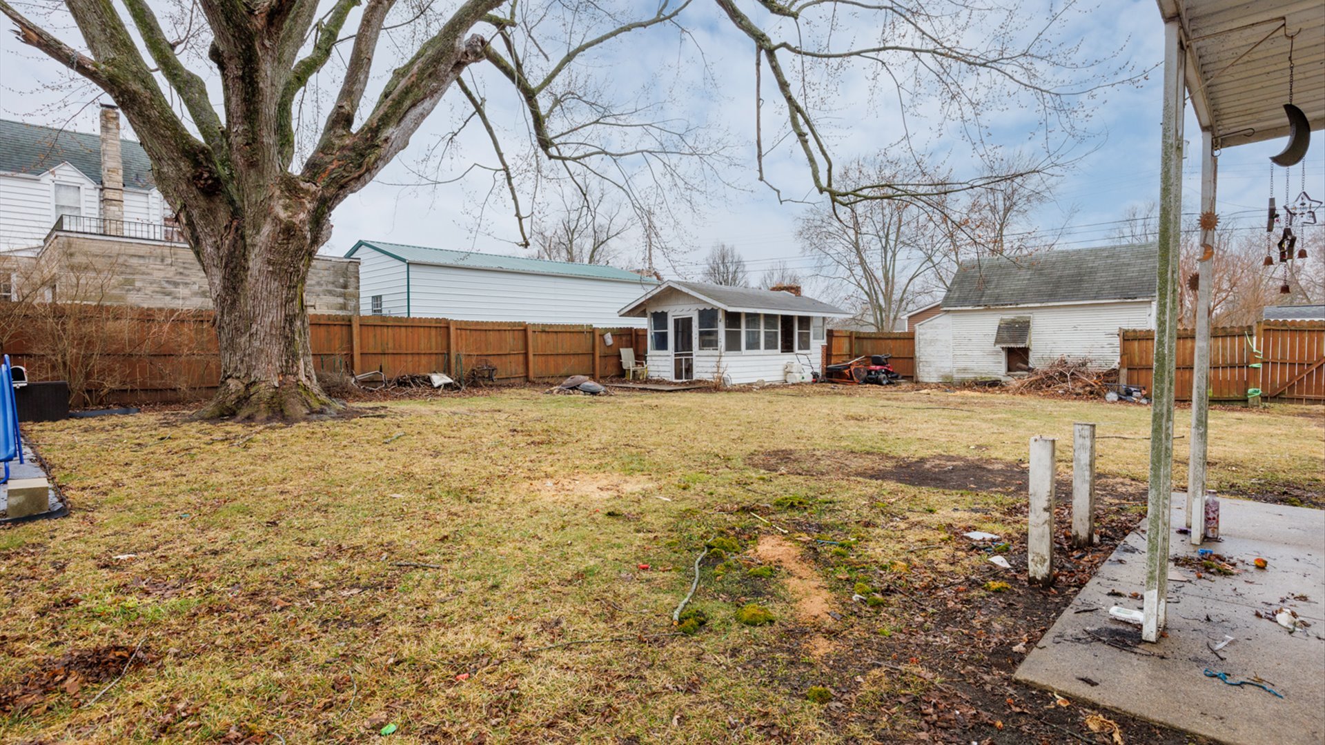 517 North Walnut Street Clinton, IL 61727 - Photo 26 of 29 a view of a yard with a house and a tree