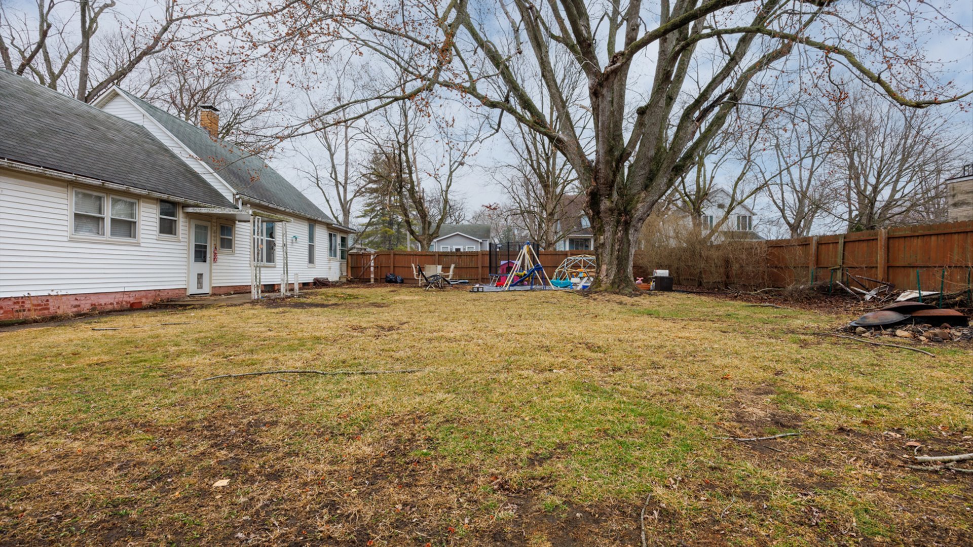 517 North Walnut Street Clinton, IL 61727 - Photo 28 of 29 a view of a yard with a large tree