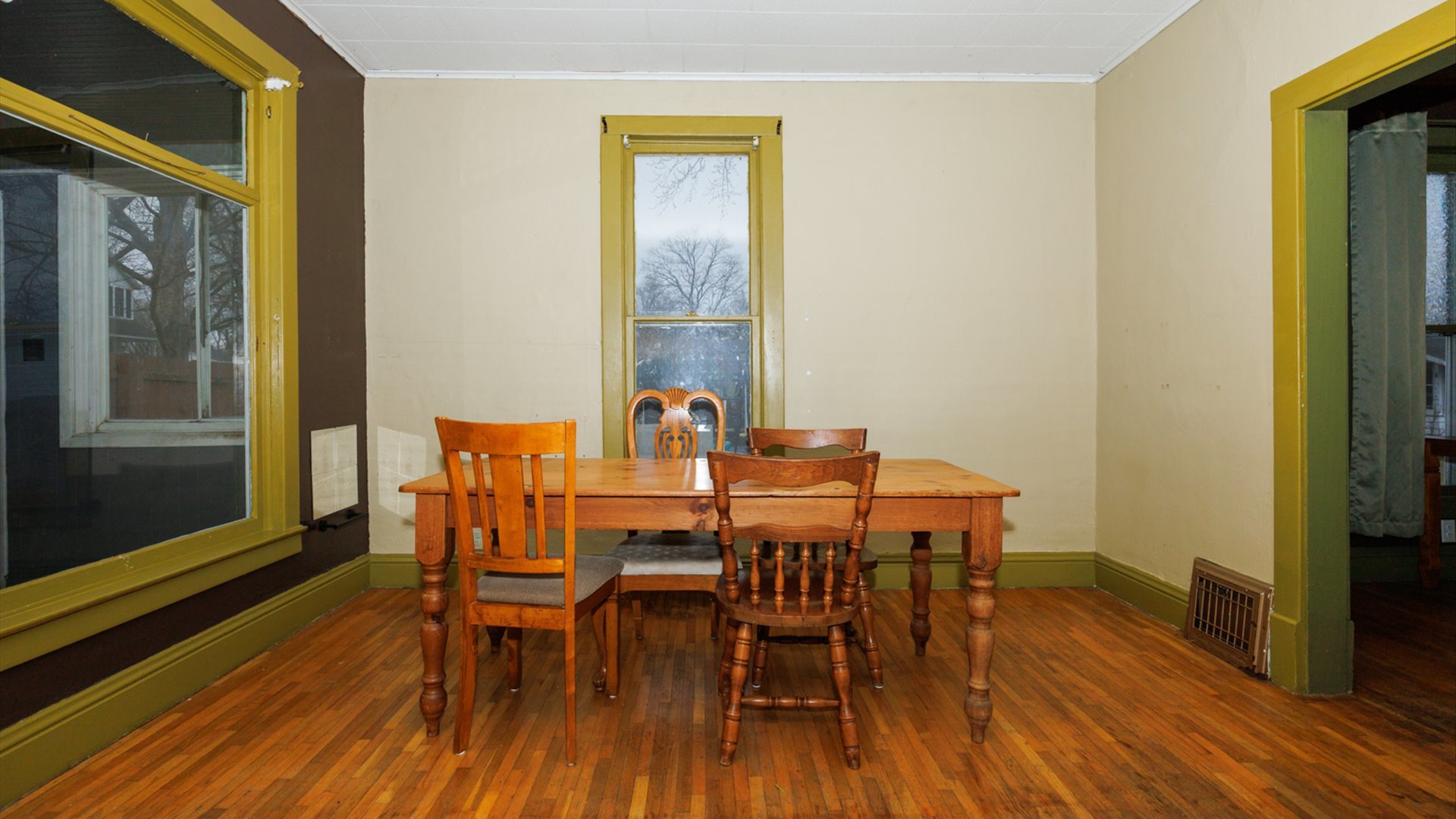 517 North Walnut Street Clinton, IL 61727 - Photo 6 of 29 a view of a dining room with furniture and wooden floor