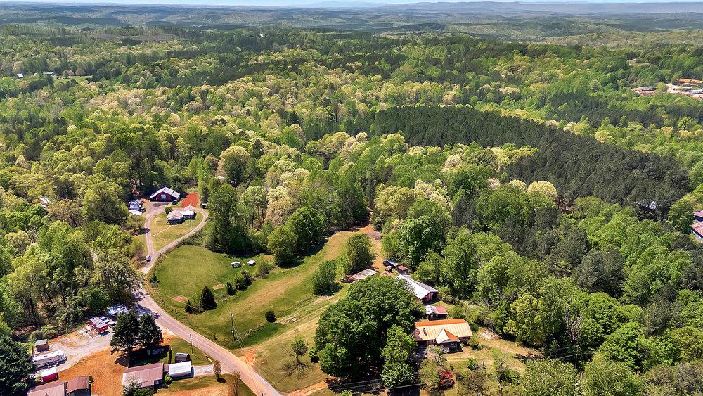 120 Collins Road Salem, SC 29676 - Photo 8 of 10 An aerial panorama reveals a vast, tree-filled landscape with scattered homes and winding roads.