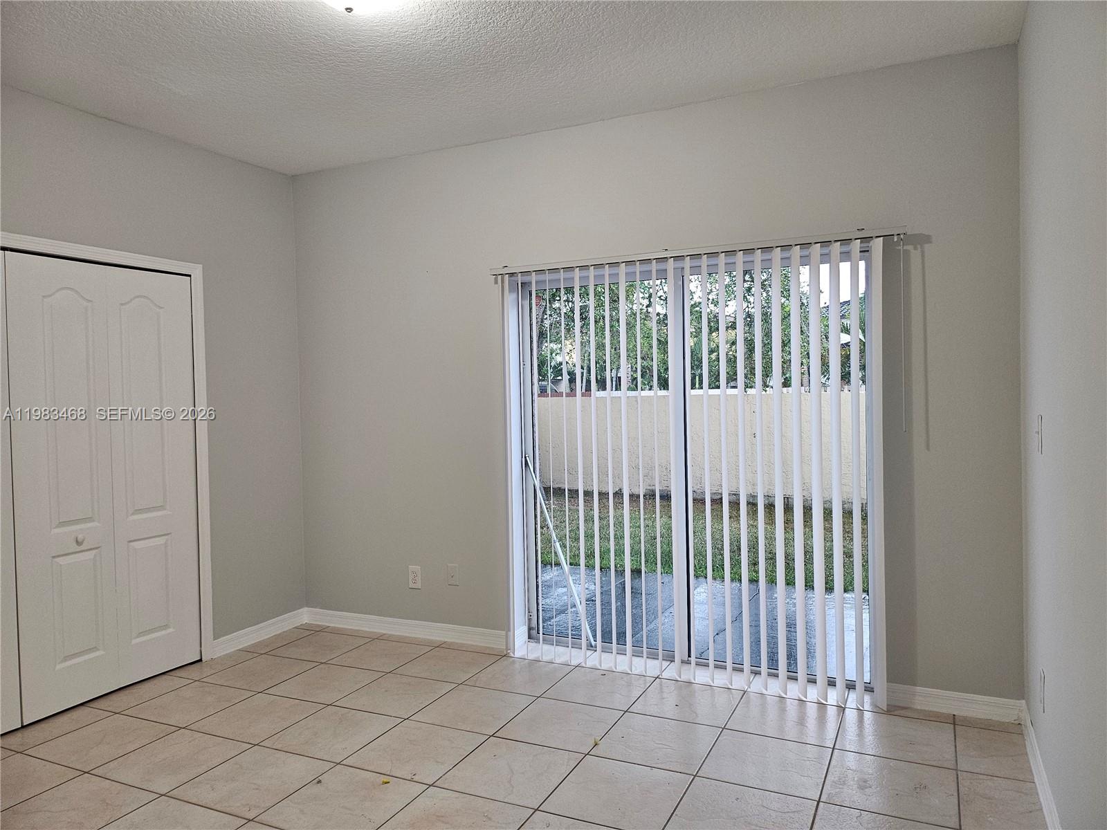 14924 Southwest 58th Street Miami, FL 33193 - Photo 11 of 17 a view of an empty room