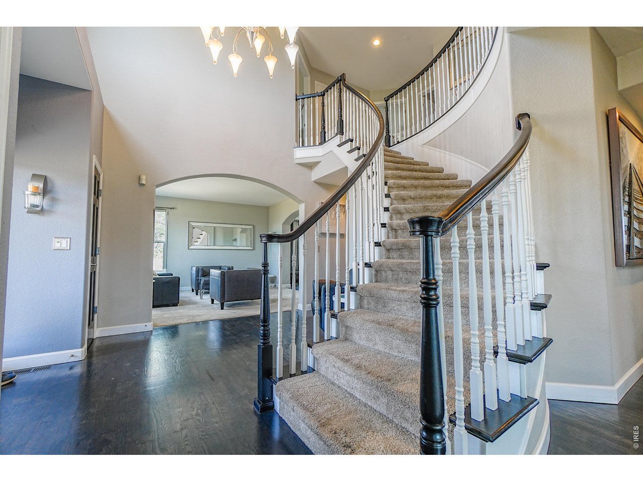 3938 Vale View Lane Mead, CO 80542 - Photo 18 of 49 a view of entryway and hall with wooden floor
