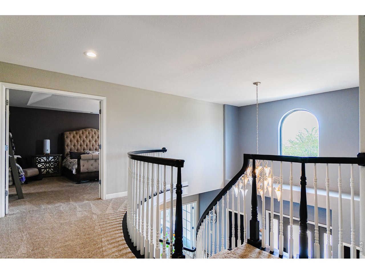3938 Vale View Lane Mead, CO 80542 - Photo 20 of 49 a view of hallway with livingroom and furniture