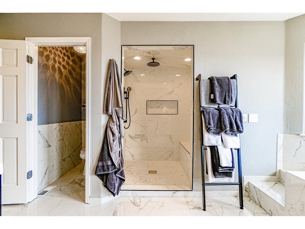 3938 Vale View Lane Mead, CO 80542 - Photo 25 of 49 a picture of a bathroom with a shower