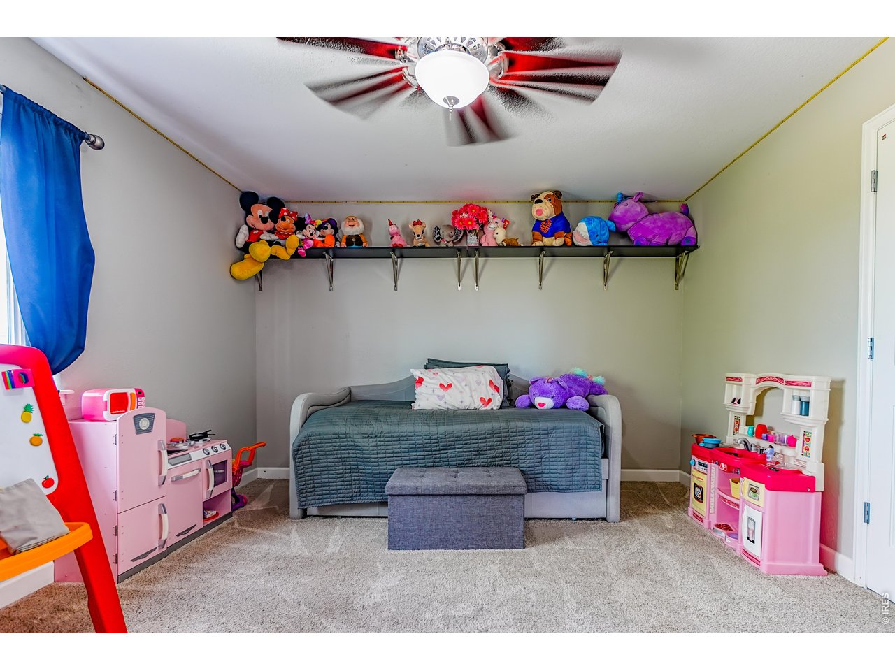 3938 Vale View Lane Mead, CO 80542 - Photo 28 of 49 a room with toys and storage