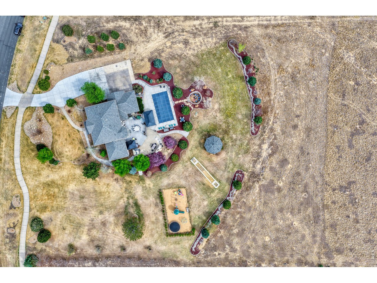 3938 Vale View Lane Mead, CO 80542 - Photo 42 of 49 an aerial view of houses with outdoor space