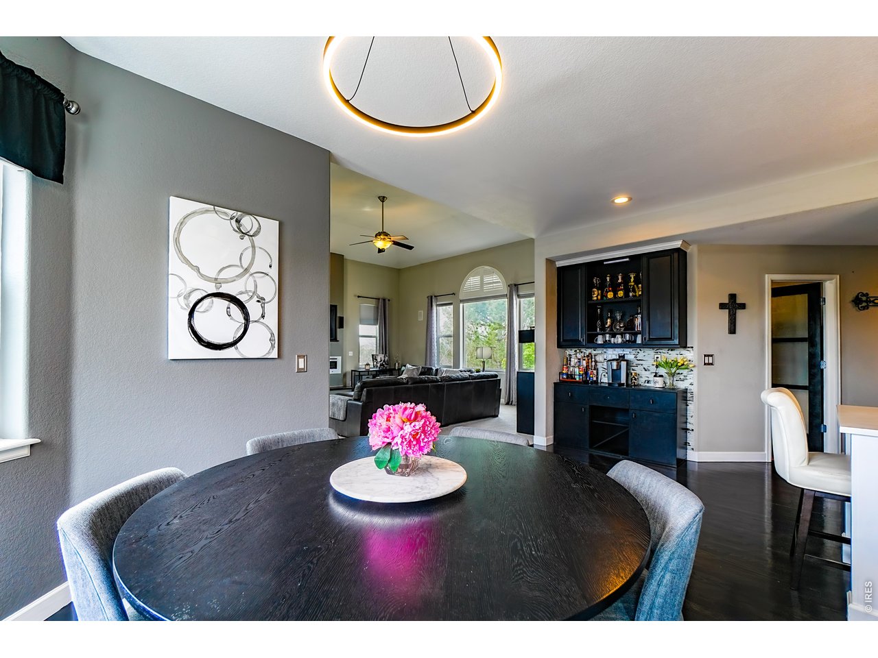3938 Vale View Lane Mead, CO 80542 - Photo 10 of 49 a view of a dining room with furniture
