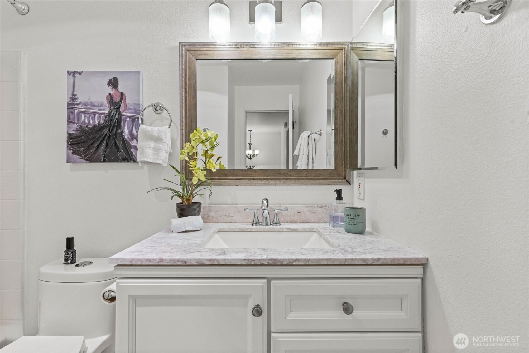 14714 53rd Avenue West, Unit 104 Edmonds, WA 98026 - Photo 22 of 35 a bathroom with a sink and a mirror