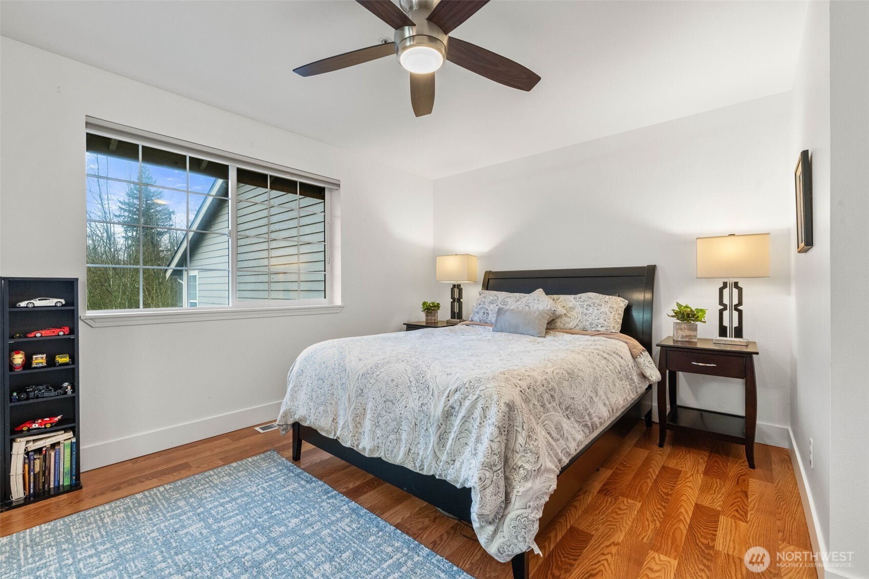 14714 53rd Avenue West, Unit 104 Edmonds, WA 98026 - Photo 24 of 35 a bedroom with a bed and a window