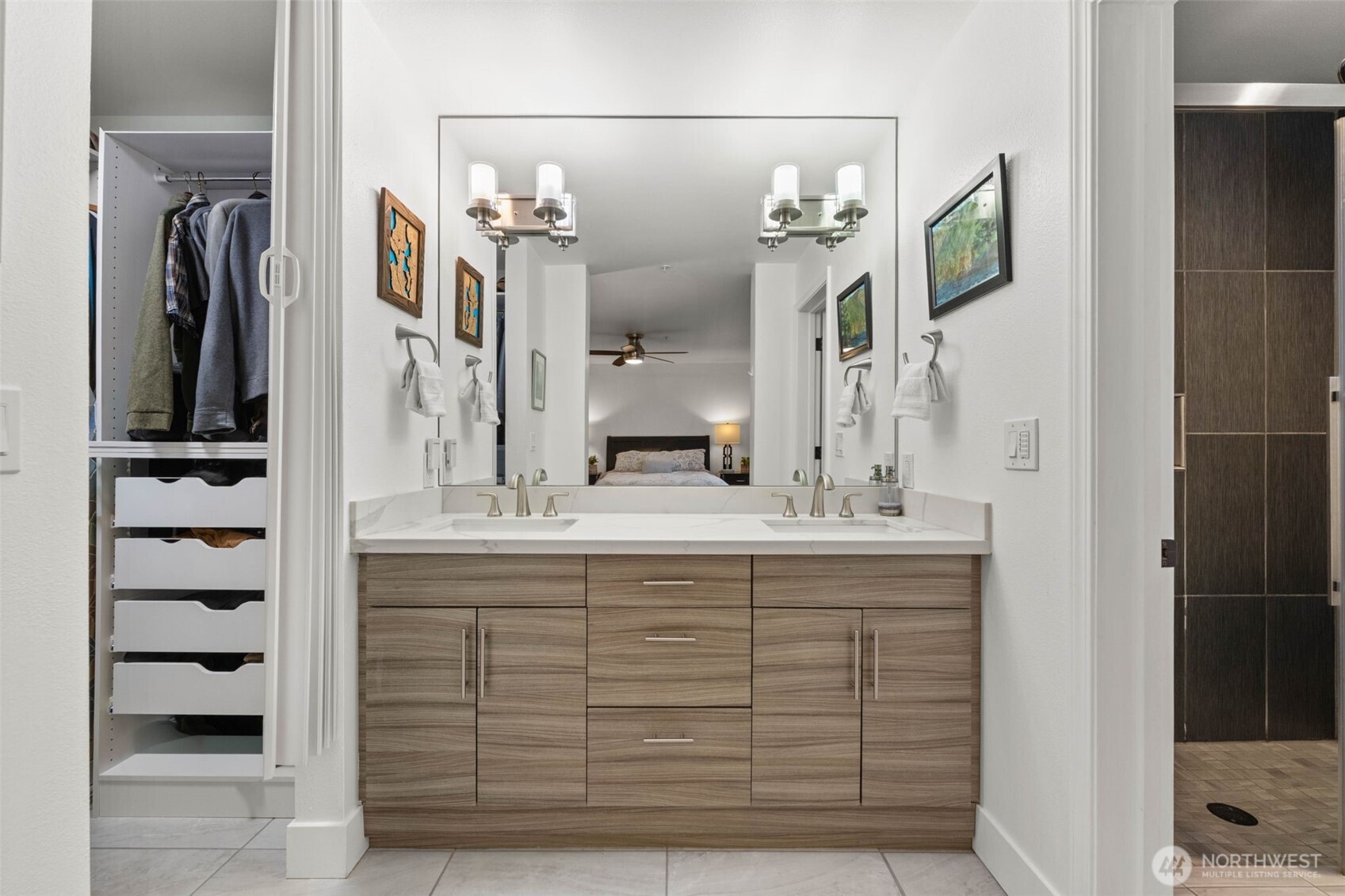 14714 53rd Avenue West, Unit 104 Edmonds, WA 98026 - Photo 27 of 35 a bathroom with a sink vanity and a mirror