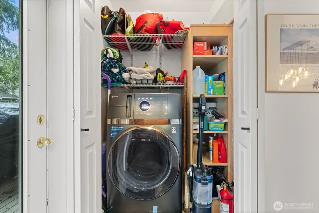 a store room with washer and dryer