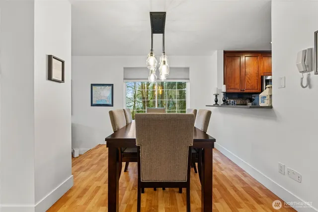 a view of a dining room with furniture window and outside view