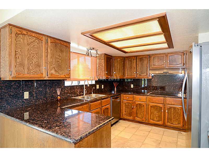 1685 Westwind Road Las Vegas, NV 89146 - Photo 8 of 26 Kitchen. BRAND NEW GRANITE COUNTER TOPS!!
