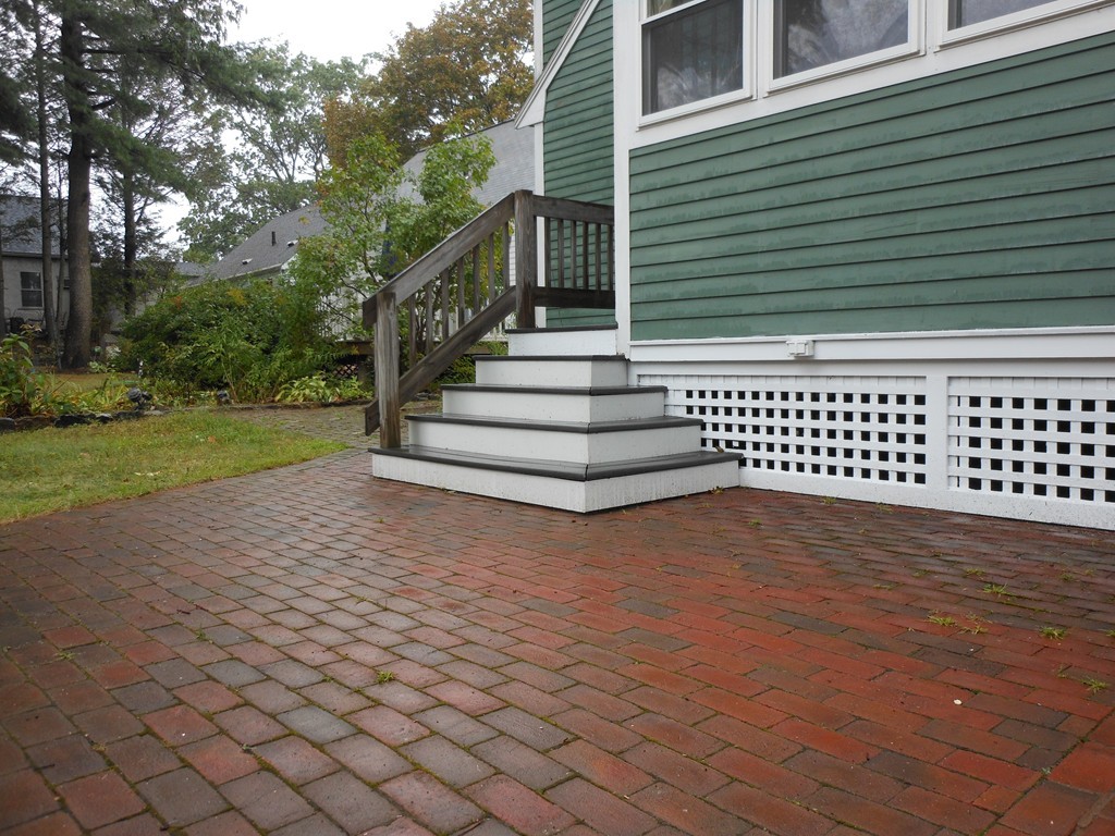 3 Outlook Road Waltham, MA 02451 - Photo 3 of 15 a view of a yard with wooden fence