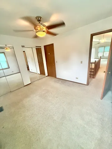 a view of a livingroom with wooden floor