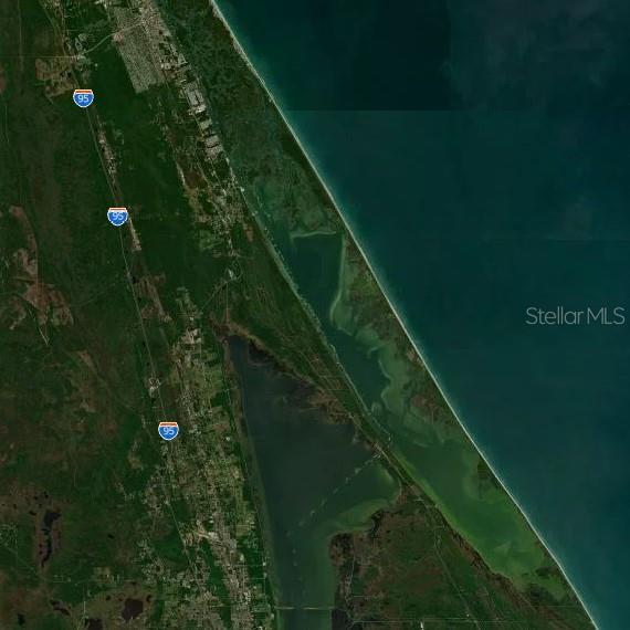 2003054 Short Parcel Mims, FL 32754 - Photo 5 of 9 a backyard of a house with lots of green space