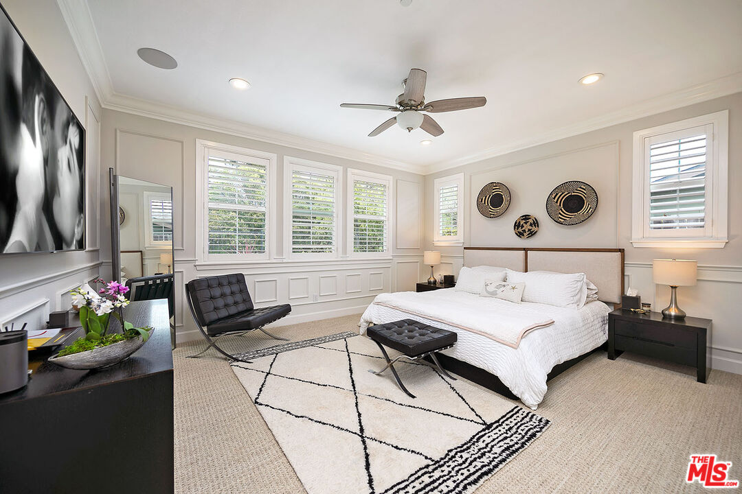 6372 Lagunitas Court Carpinteria, CA 93013 - Photo 11 of 19 a bedroom with a bed and a chandelier