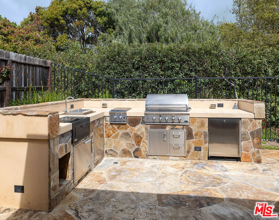 6372 Lagunitas Court Carpinteria, CA 93013 - Photo 17 of 19 a view of a dinning area with brick wall