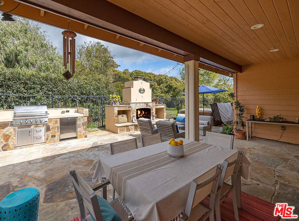 6372 Lagunitas Court Carpinteria, CA 93013 - Photo 18 of 19 a view of a dining room with a table and chairs